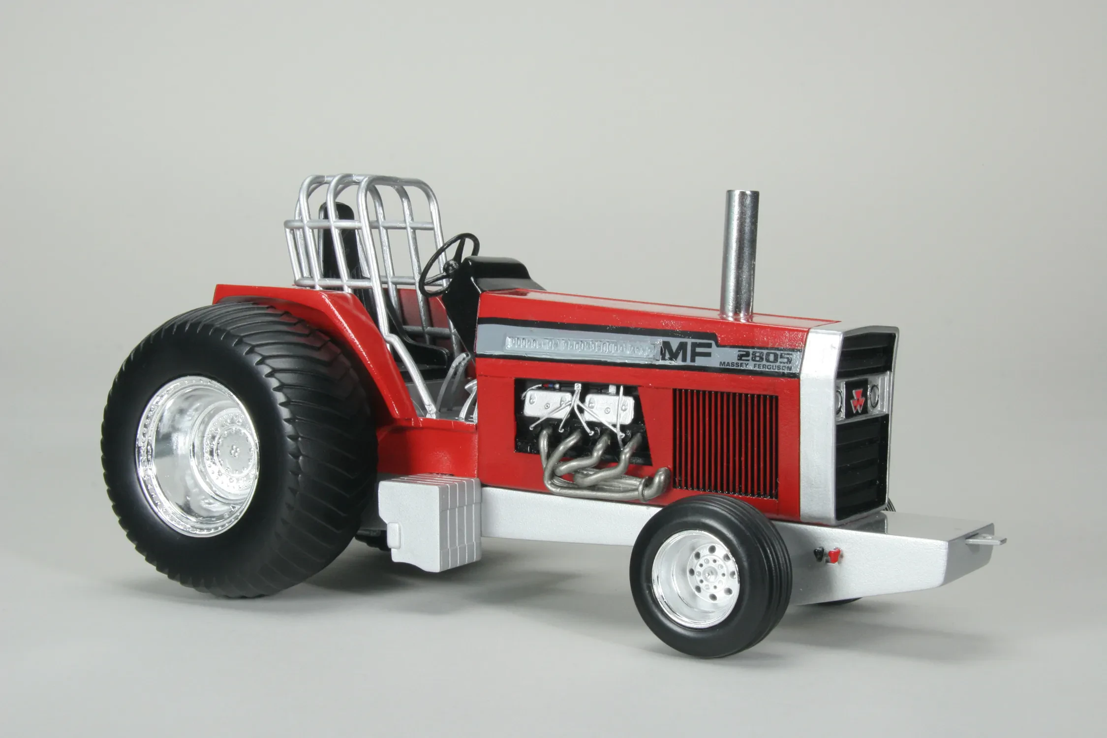 variety of diecast tractor pulling toy brands