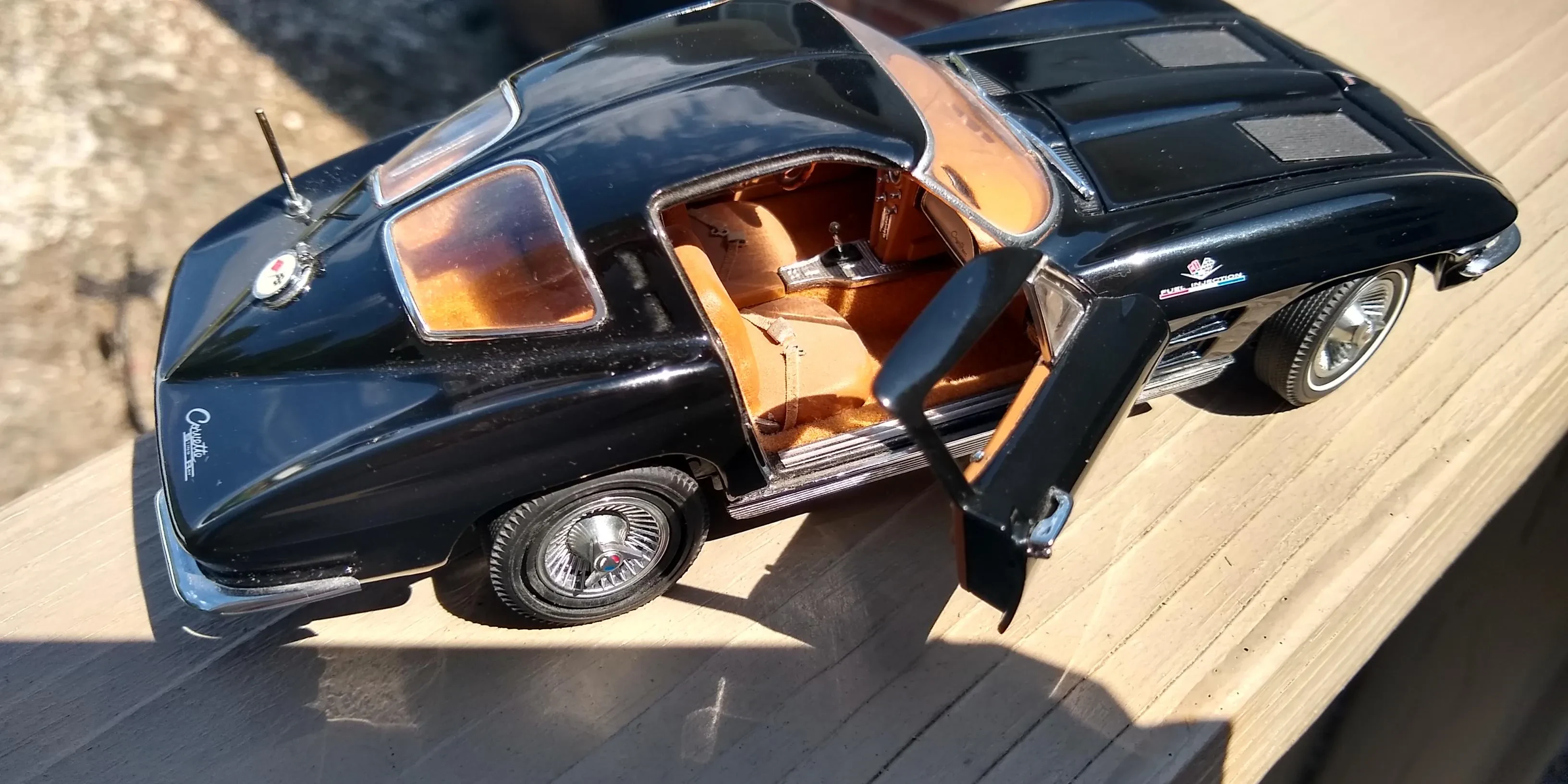 Happy customer with restored diecast car