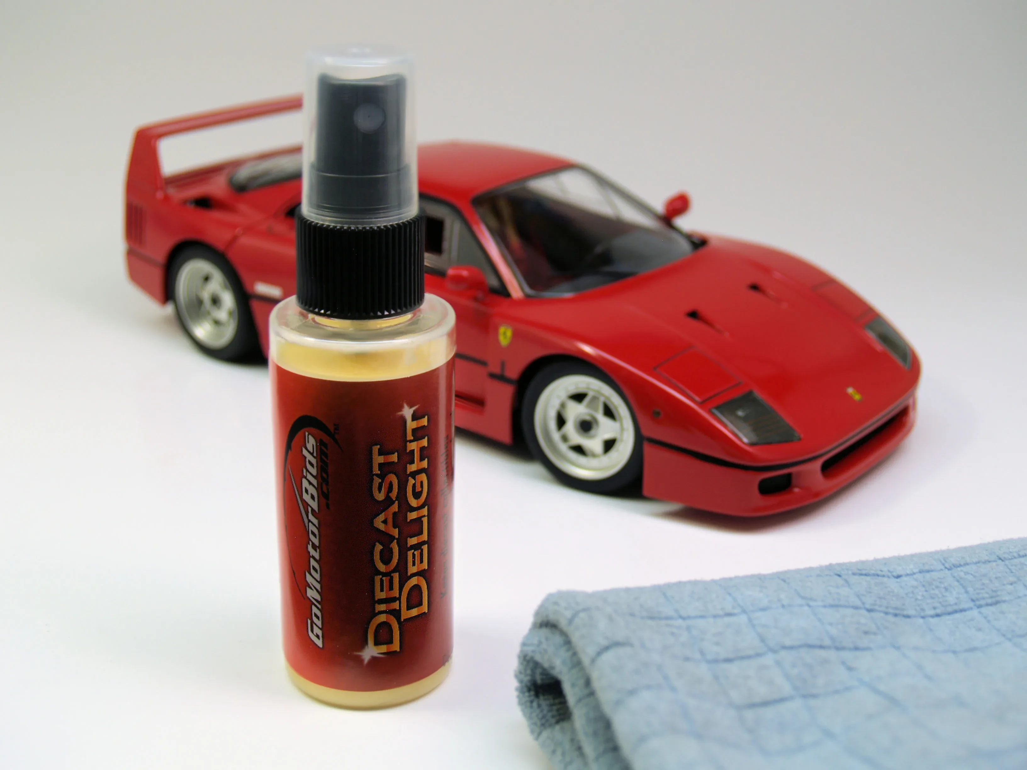 Cleaning diecast car with soft brush