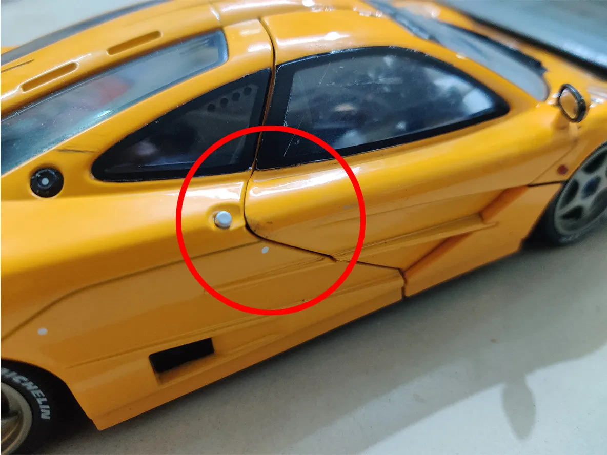 Diecast car with damage