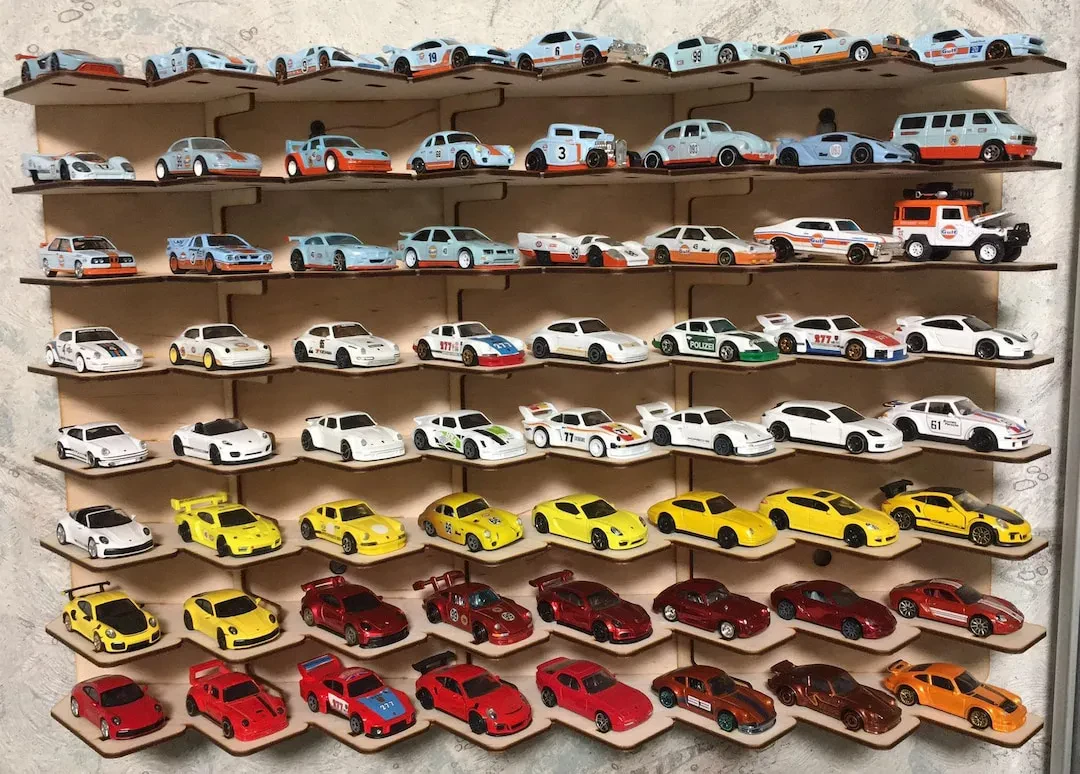 Variety of diecast cars on shelves