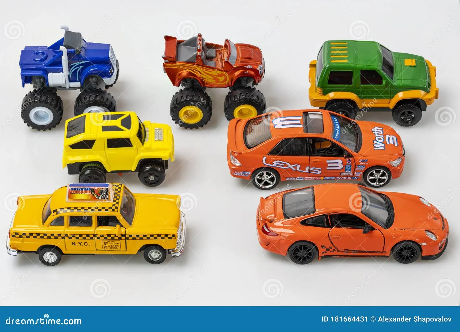 Child carefully examining a diecast car