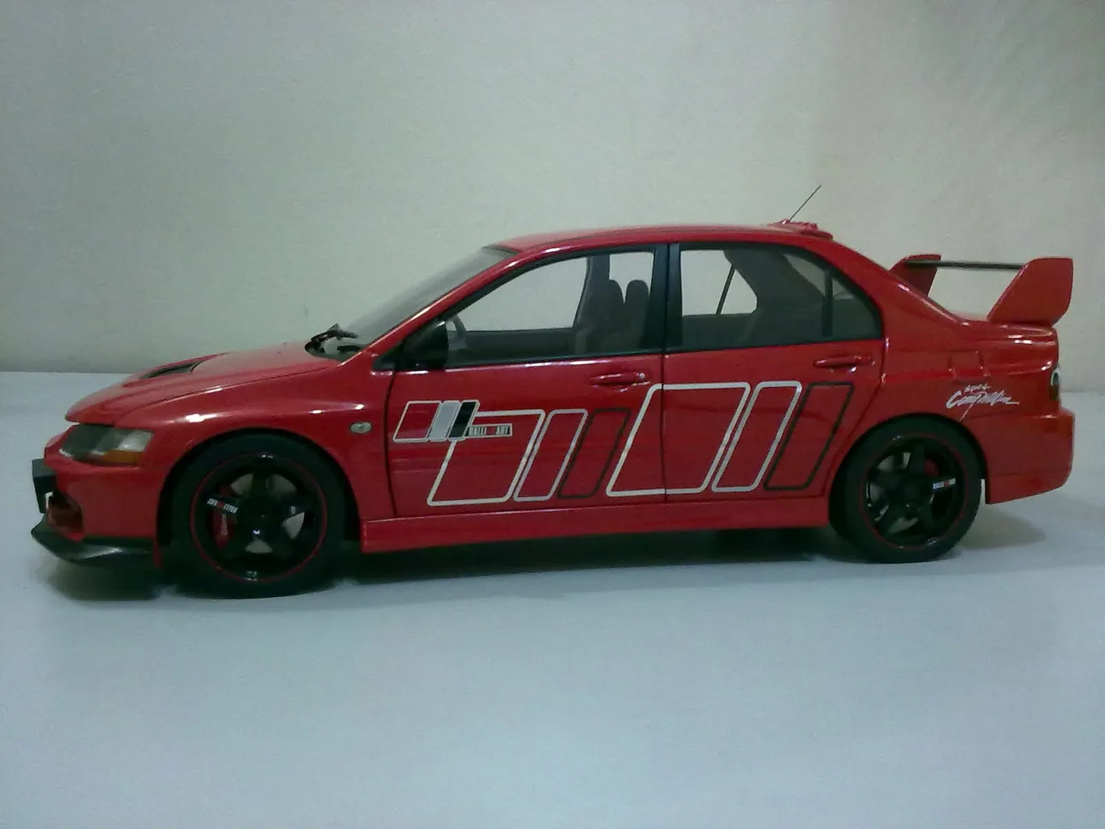 img/2637_totally-awesome-mitsubishi-lancer-evolution-ix-diecast-models.webp