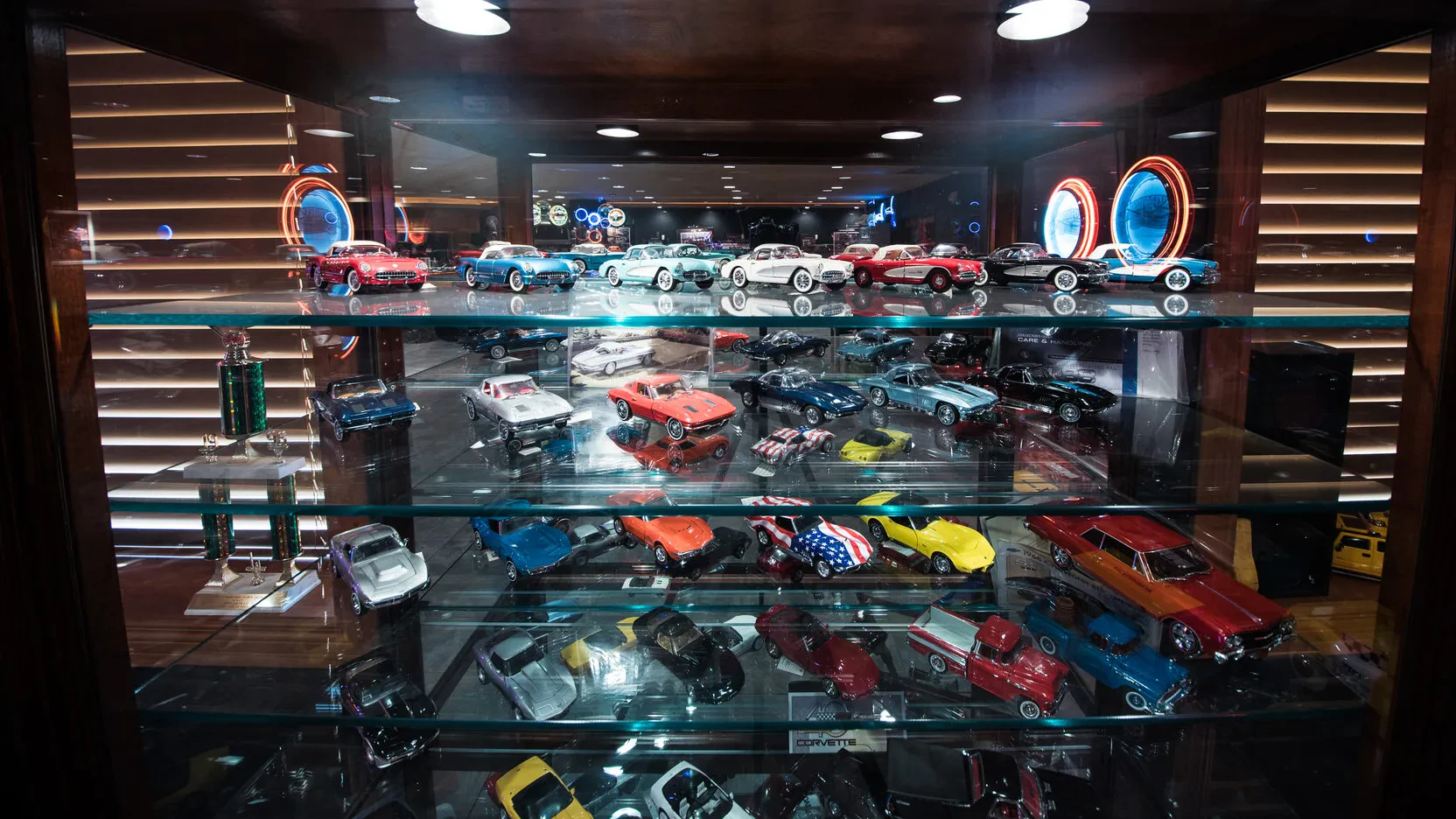 Diecast locomotives displayed in a glass case